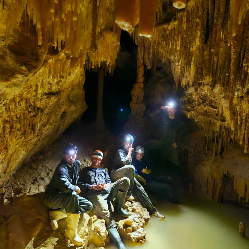 Caving with a group. Team building experiences