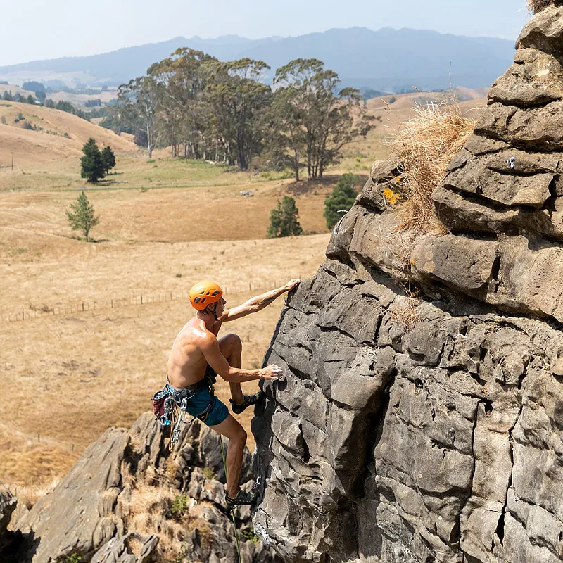 Climber on a sport climbing route near Raglan